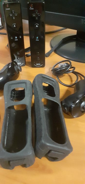 Mandos con motion plus con correa funda y nunchucks for sale