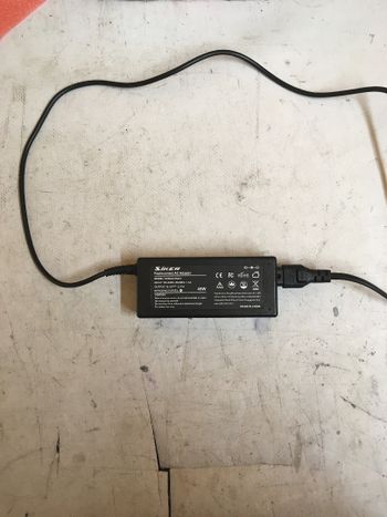 SiKER ReplacementACAdapter CE MODEL:SK90A195231 OUTPUT:19.5V= 45W EFFICIENCYLEVEL GuanimerFle