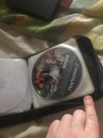 Get ps2 slim con memory card y algunos juevos