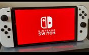 Nintendo Switch OLED 64GB Baneada, Como nueva