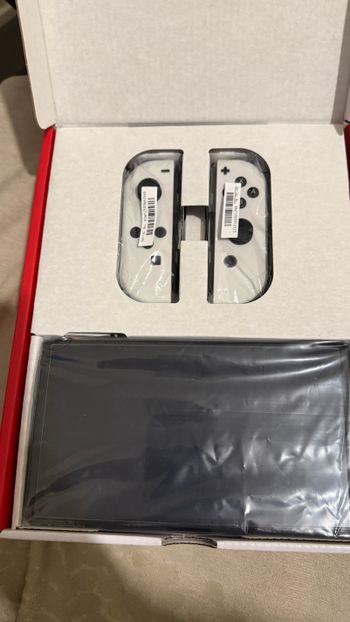 Redeem Nintendo Switch OLED 64GB Baneada, Como nueva