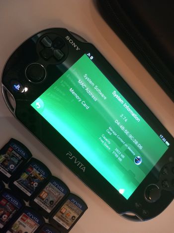 psvita oled + 8 žaidimai