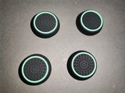 4x Pultelio analogų papildomos apsauginės gumos / caps'ai / stick'ų apsauga