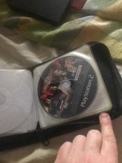 Get ps2 slim con memory card y algunos juevos