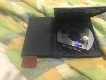 ps2 slim con memory card y algunos juevos