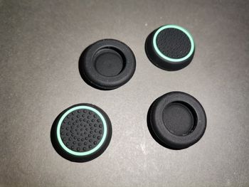 4x Pultelio analogų papildomos apsauginės gumos / caps'ai / stick'ų apsauga