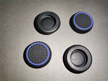 4x Pultelio analogų papildomos apsauginės gumos / caps'ai / stick'ų apsauga