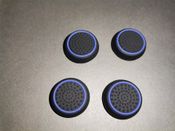 4x Pultelio analogų papildomos apsauginės gumos / caps'ai / stick'ų apsauga