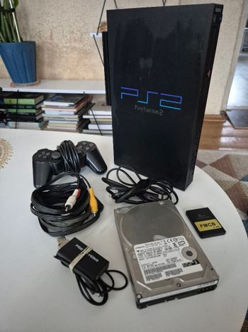 PlayStation 2 atrištas + Network Adapter + 2x 500 GB HDD
