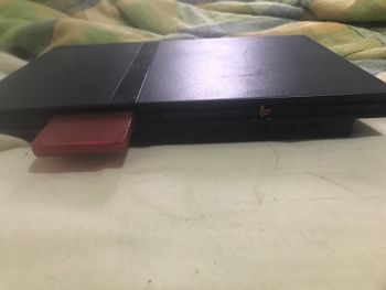ps2 slim con memory card y algunos juevos