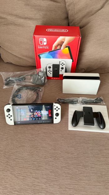 Nintendo Switch OLED 64GB Baneada, Como nueva