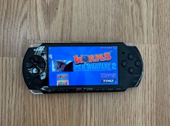 PSP 3000 + 66 zaidimai!
