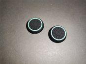 2x Pultelio analogų papildomos apsauginės gumos / caps'ai / stick'ų apsauga