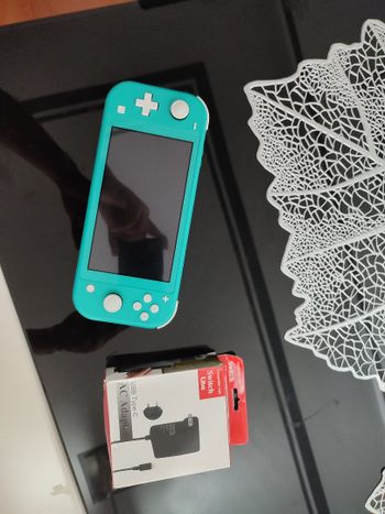 Nintendo switch lite + juego