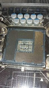 ASRock X58 Extreme 3 Intel X58 ATX DDR3 LGA1366 3 x PCI-E x16 Slots Motherboard