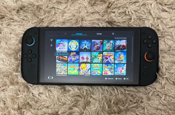 Nintendo Switch + Zaidimai + Garantija